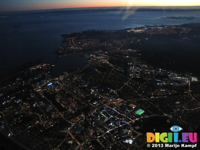 SX32616 UK city lights from airplane